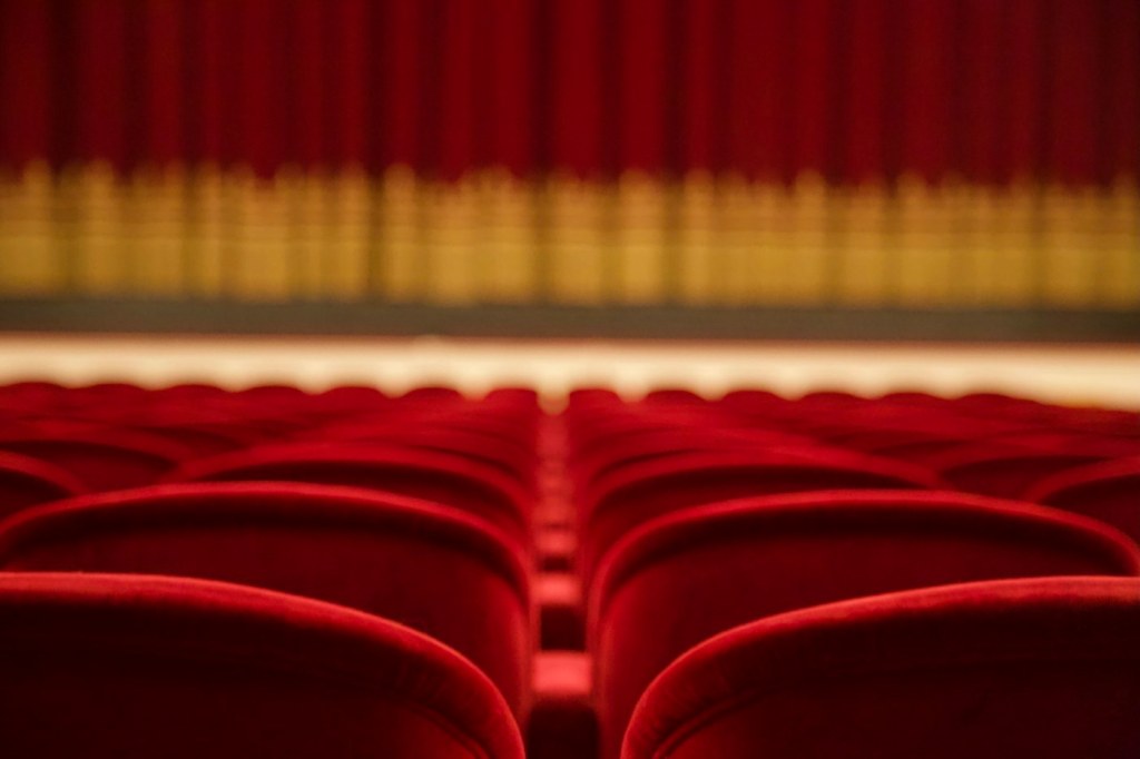 Atmospheric empty theater stage and auditorium, used as illustrative photography